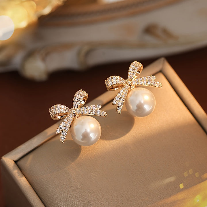 Chic Vintage-Inspired Bow & Faux Pearl Stud Earrings with Sparkling Rhinestones - Perfect for Parties & Festivals - Total Trends Fusion