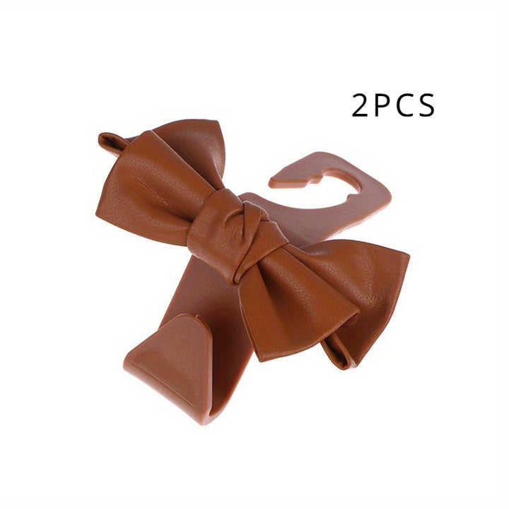 2pc Stylish PU Leather Car Hooks with Bow Tie - Perfect for Seat Headrest Organization and Auto Fastener Hangers - Enhance Your Car Storage