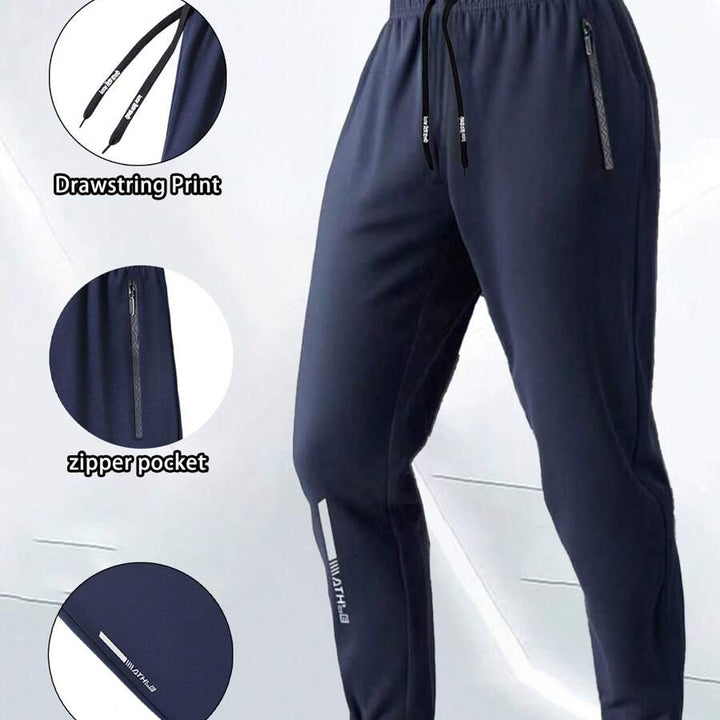 Navy blue men's ankle-zip sweatpants with drawstring, zipper pocket, and cuff 