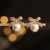 Chic Vintage-Inspired Bow & Faux Pearl Stud Earrings with Sparkling Rhinestones - Perfect for Parties & Festivals - Total Trends Fusion