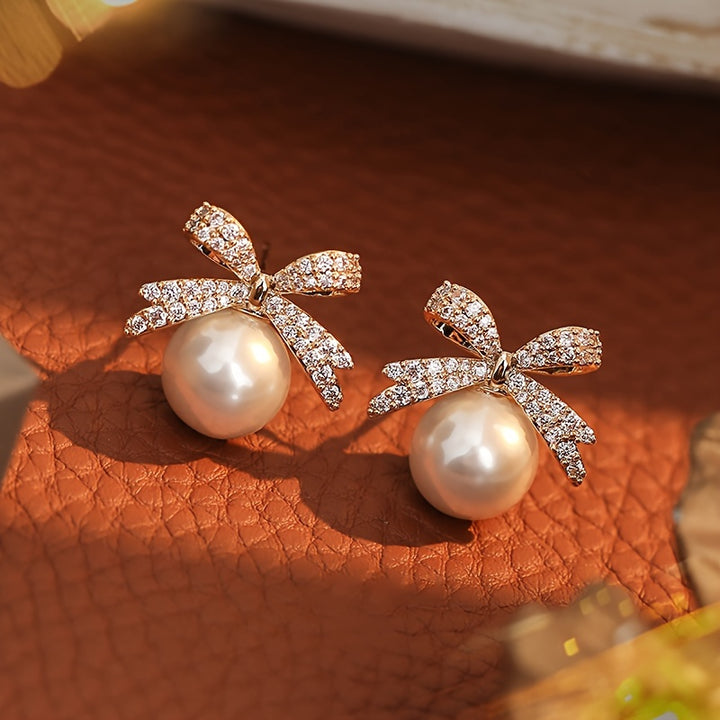 Chic Vintage-Inspired Bow & Faux Pearl Stud Earrings with Sparkling Rhinestones - Perfect for Parties & Festivals - Total Trends Fusion