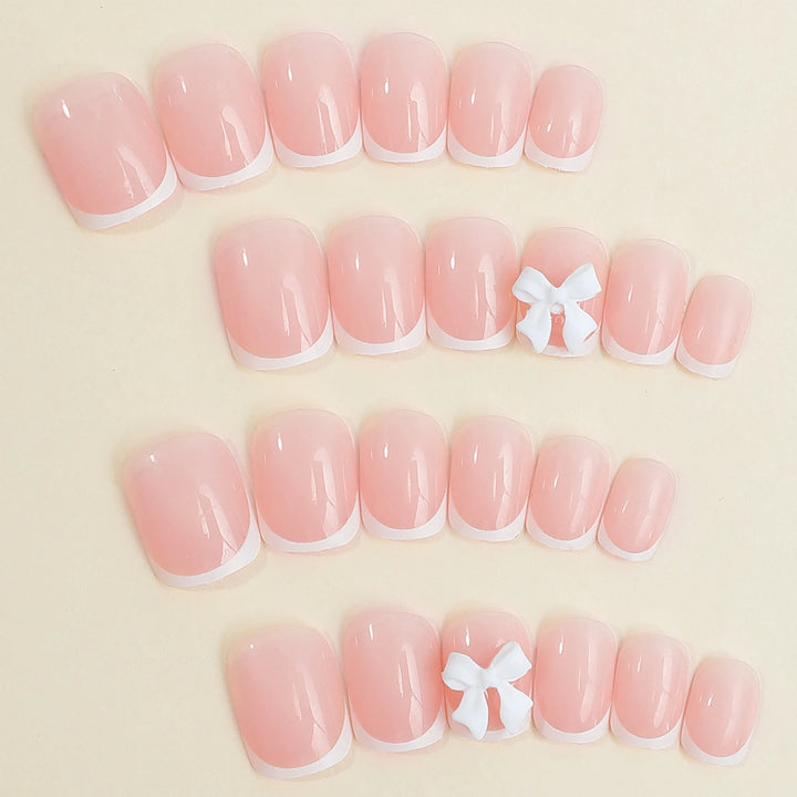 "French Tips Press-On Nails | Elegant Long-Lasting Artificial Manicure"