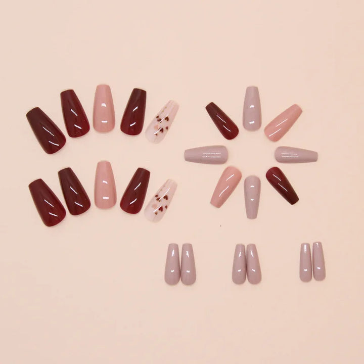 A full set of 24 long coffin-shaped fake nails with solid color fake nails and a heart design, including 1 jelly glue and 1 rub
