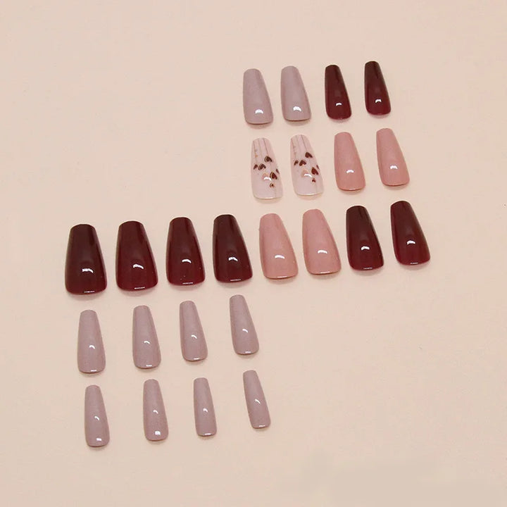 A full set of 24 long coffin-shaped fake nails with solid color fake nails and a heart design, including 1 jelly glue and 1 rub