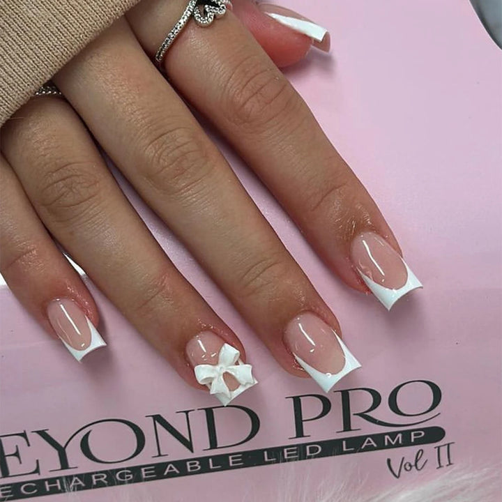 "French Tips Press-On Nails | Elegant Long-Lasting Artificial Manicure"